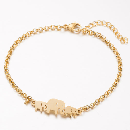 A golden elephant bracelet laid out in a circle