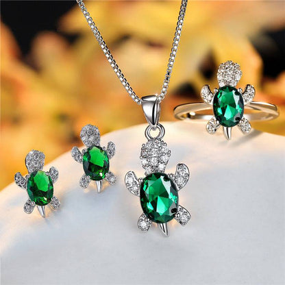 A green turtle jewelry set